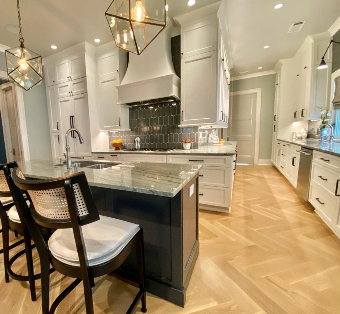 A kitchen with two chairs and a counter